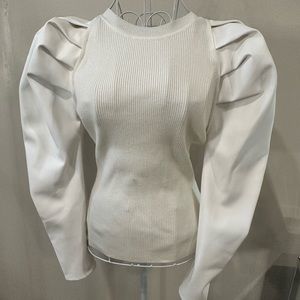 White  sweater with faux leather puff sleeves . Worn once for a photo shoot.